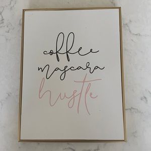 “Coffee, mascara, hustle” sign